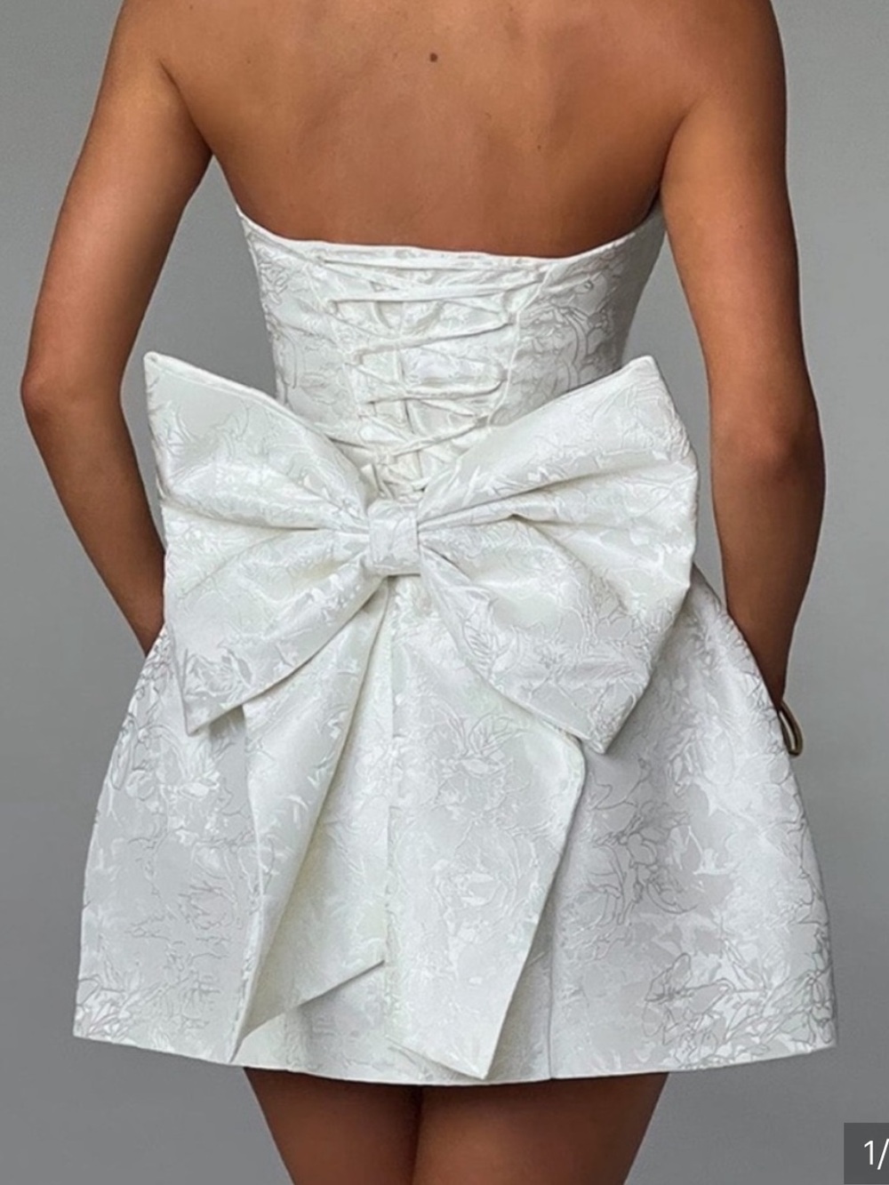 Babyboo Strapless White Jacquard Mini Dress with Statement Bow